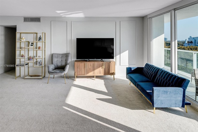 100 Bayview Unit 617, Sunny Isles Beach, FL 33160 - living room featuring carpet flooring