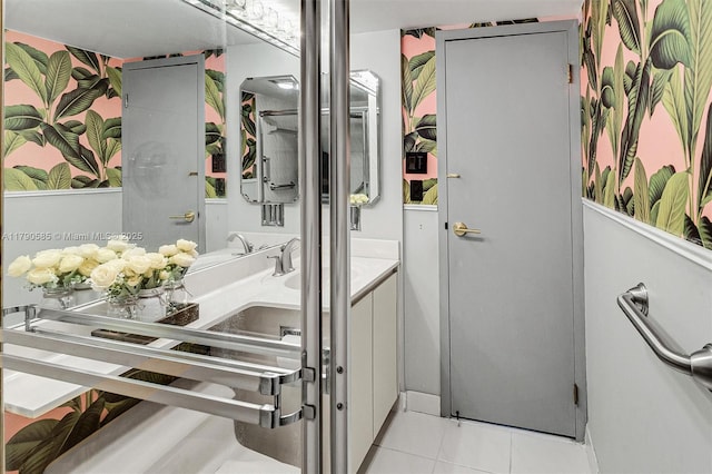 100 Bayview Unit 617, Sunny Isles Beach, FL 33160 - bathroom with tile patterned floors and vanity