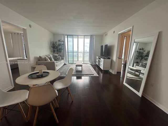 50 Biscayne Blvd Unit 3308, Miami, FL 33132 - dining space with dark wood finished floors, expansive windows, and baseboards