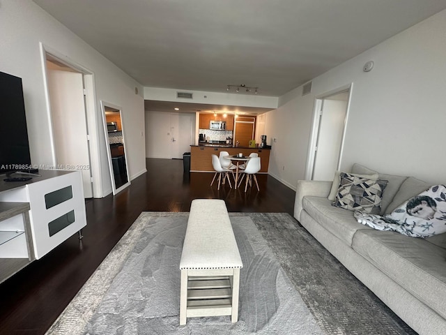 50 Biscayne Blvd Unit 3308, Miami, FL 33132 - living area featuring visible vents, baseboards, and dark wood-style floors