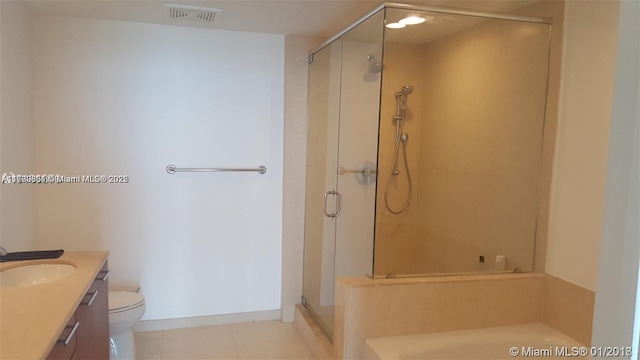 bathroom with visible vents, toilet, and a stall shower