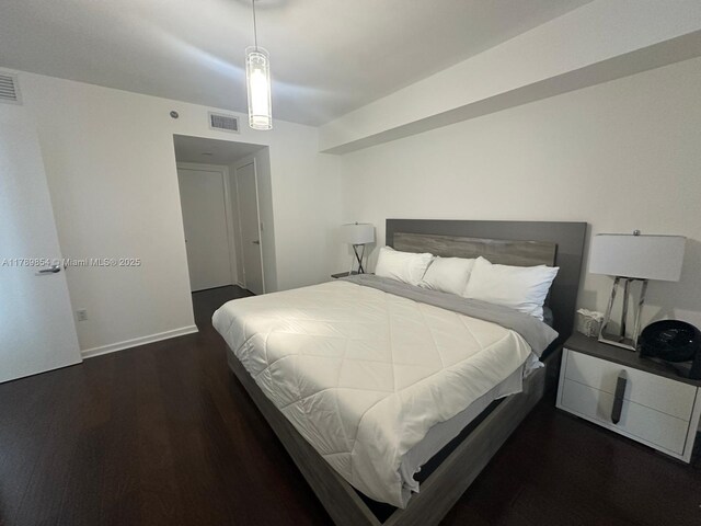 50 Biscayne Blvd Unit 3308, Miami, FL 33132 - bedroom featuring visible vents, wood finished floors, and baseboards