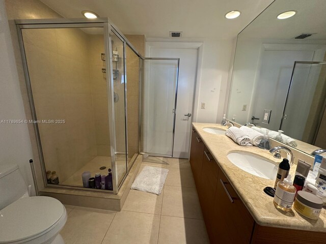 50 Biscayne Blvd Unit 3308, Miami, FL 33132 - bathroom with toilet, visible vents, tile patterned flooring, and a sink