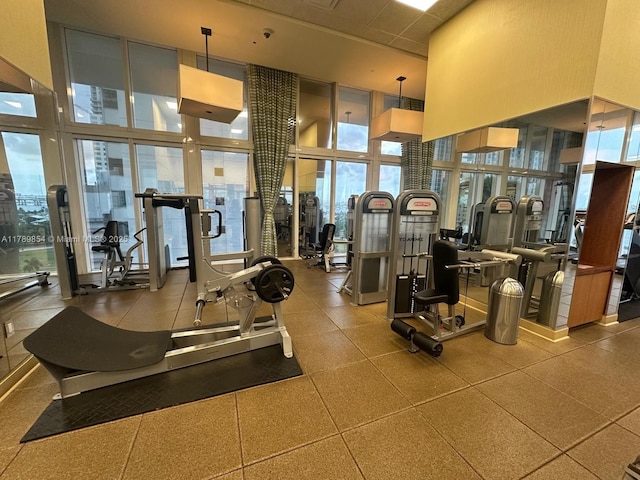 50 Biscayne Blvd Unit 3308, Miami, FL 33132 - gym with expansive windows and a towering ceiling