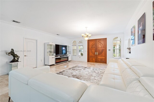 105 S Royal Poinciana Blvd, Miami Springs, FL 33166 - living area featuring ornamental molding, marble finish floor, a notable chandelier, and visible vents
