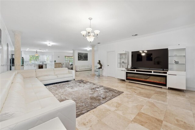 105 S Royal Poinciana Blvd, Miami Springs, FL 33166 - living area with an inviting chandelier, visible vents, ornamental molding, and decorative columns