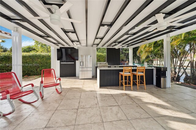 105 S Royal Poinciana Blvd, Miami Springs, FL 33166 - view of patio with fence, ceiling fan, and outdoor wet bar