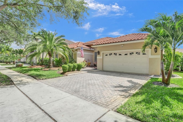 1543 NW 182nd Way, Pembroke Pines, FL 33029 - mediterranean / spanish-style house featuring stucco siding, a garage, decorative driveway, and a tile roof
