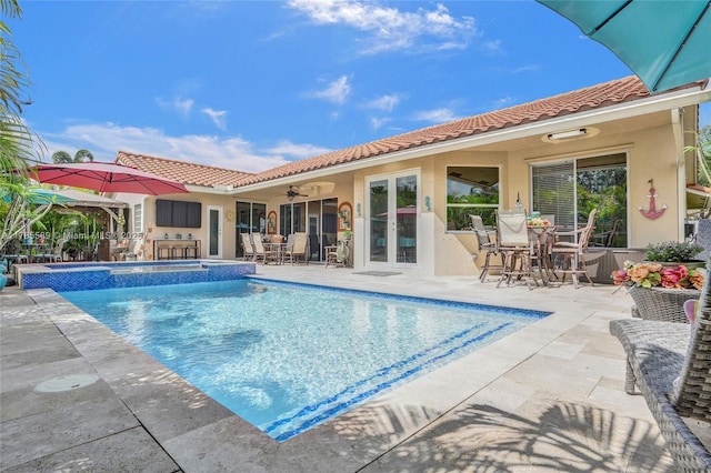 1543 NW 182nd Way, Pembroke Pines, FL 33029 - view of pool featuring a ceiling fan, a patio, outdoor dining space, and a pool with connected hot tub