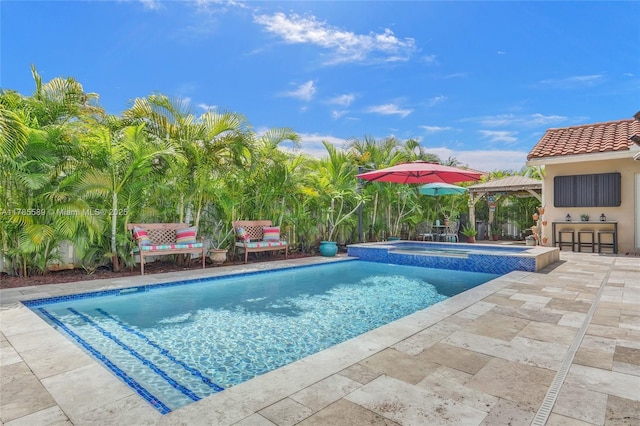 1543 NW 182nd Way, Pembroke Pines, FL 33029 - view of pool featuring a patio area and a pool with connected hot tub