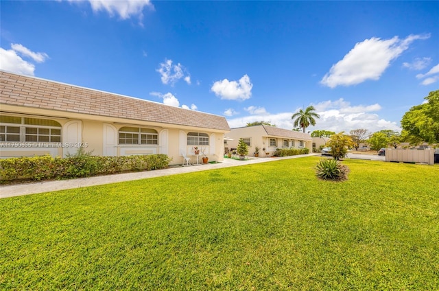 16823 SW 113th Ave Unit V41342, Miami, FL 33157 - ranch-style house with a front yard and stucco siding