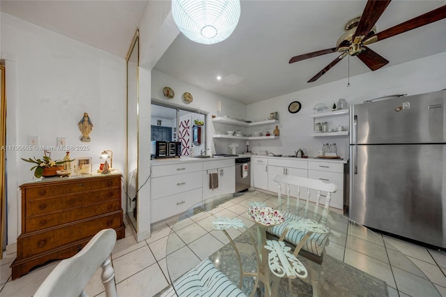 16823 SW 113th Ave Unit V41342, Miami, FL 33157 - kitchen with white cabinets, stainless steel appliances, open shelves, and light tile patterned floors