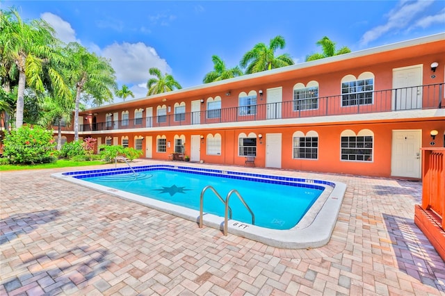 pool featuring a patio area