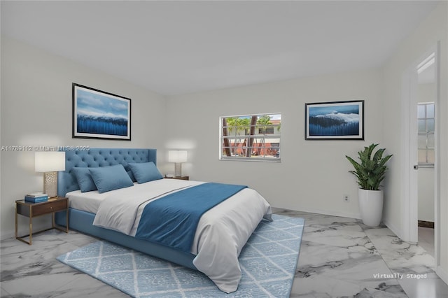 bedroom with marble finish floor and baseboards