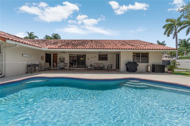view of pool with a patio and a fenced in pool
