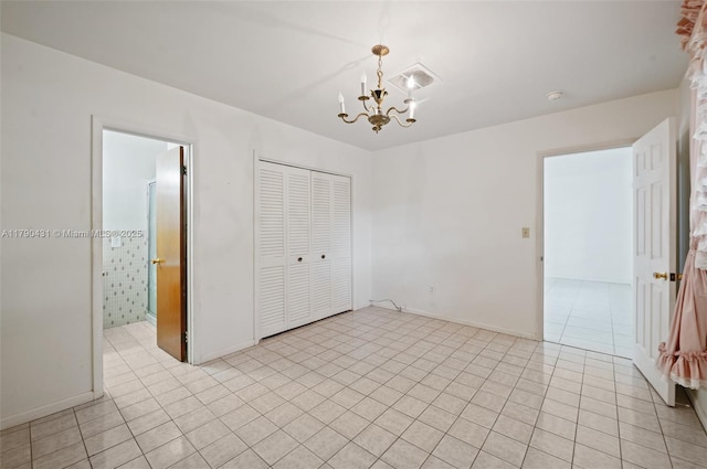 14515 Mahogany Ct, Miami Lakes, FL 33014 - interior space featuring light tile patterned flooring, baseboards, an inviting chandelier, and visible vents