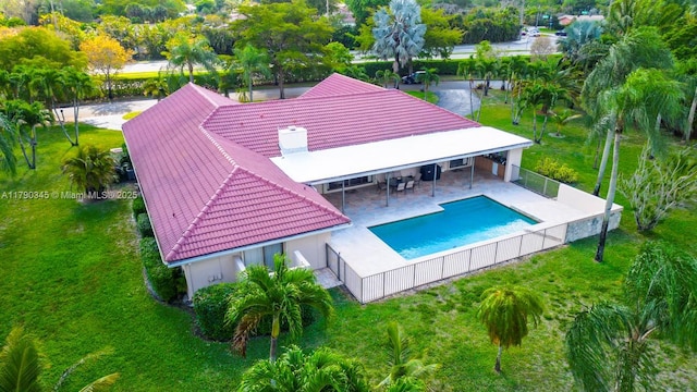 1800 NW 105th Ln, Coral Springs, FL 33071 - view of swimming pool featuring a patio, a fenced in pool, and a fenced backyard