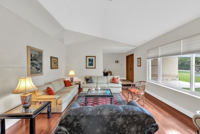 1800 NW 105th Ln, Coral Springs, FL 33071 - living room featuring lofted ceiling, wood finished floors, and baseboards