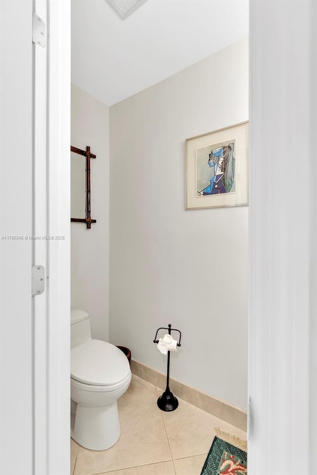 1800 NW 105th Ln, Coral Springs, FL 33071 - bathroom with toilet, visible vents, tile patterned floors, and baseboards