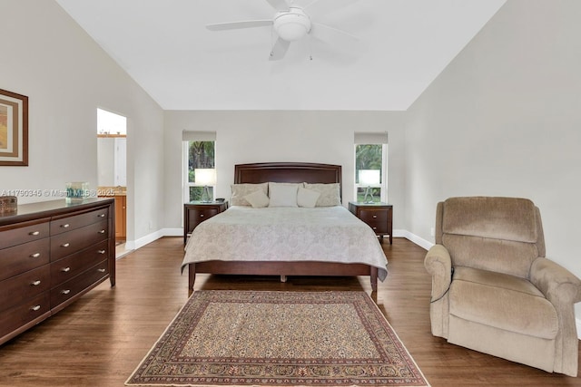 1800 NW 105th Ln, Coral Springs, FL 33071 - bedroom featuring dark wood-style flooring, multiple windows, and baseboards