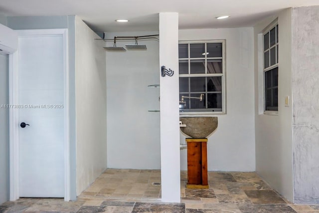 1185 Biarritz Dr, Miami Beach, FL 33141 - entrance to property featuring stucco siding and a wall mounted AC