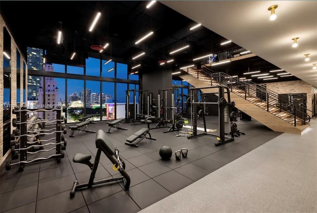 398 NE 5th St Unit 1515, Miami, FL 33132 - workout area with a city view and expansive windows
