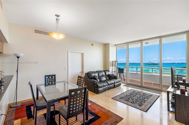 1800 N Bayshore Dr Unit 509, Miami, FL 33132 - dining space with floor to ceiling windows