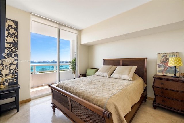 1800 N Bayshore Dr Unit 509, Miami, FL 33132 - bedroom with a water view and baseboards