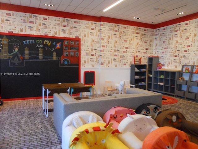 1080 Brickell Ave Unit 4005, Miami, FL 33131 - recreation room featuring a wainscoted wall, wallpapered walls, and carpet floors