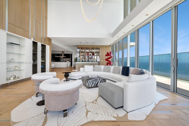 living room featuring a high ceiling