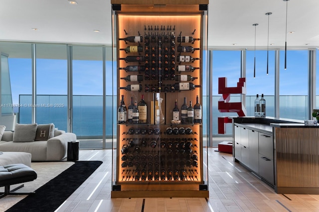 wine room featuring expansive windows