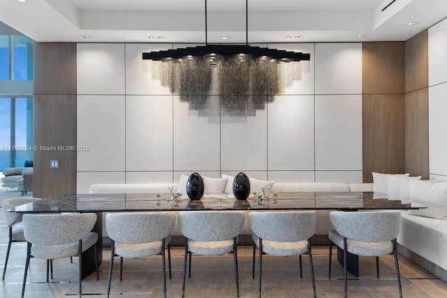 dining room featuring recessed lighting and light wood-style flooring