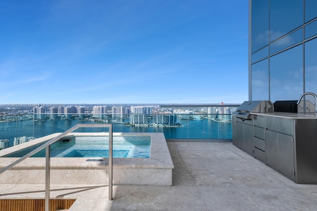 view of pool with a water view, a community hot tub, and area for grilling