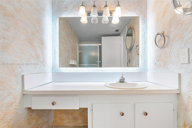 11930 N Bayshore Dr Unit 1007, North Miami, FL 33181 - bathroom featuring visible vents, a shower with shower door, and vanity