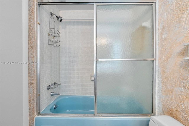 11930 N Bayshore Dr Unit 1007, North Miami, FL 33181 - bathroom with enclosed tub / shower combo and toilet