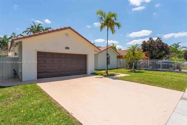 mediterranean / spanish house with driveway, fence, a tiled roof, an attached garage, and stucco siding