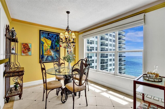 3500 Galt Ocean Dr Unit 1007, Fort Lauderdale, FL 33308 - tiled living room with ornamental molding, a textured ceiling, and a water view