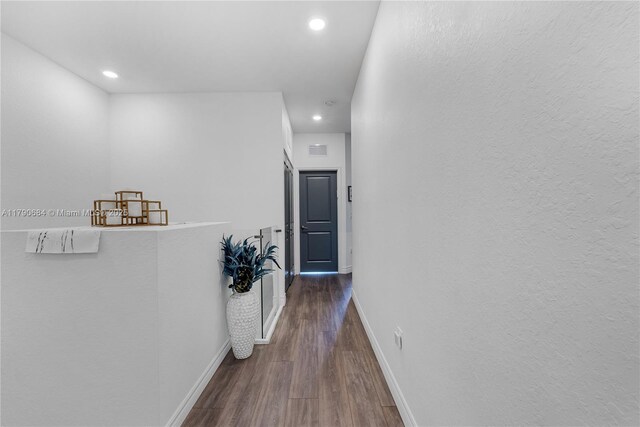 21364 NE 2nd Ct, Miami, FL 33179 - hall featuring baseboards, recessed lighting, wood finished floors, and visible vents
