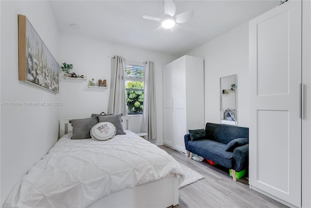 21364 NE 2nd Ct, Miami, FL 33179 - bedroom featuring light wood-style floors and ceiling fan
