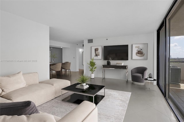 living area featuring visible vents