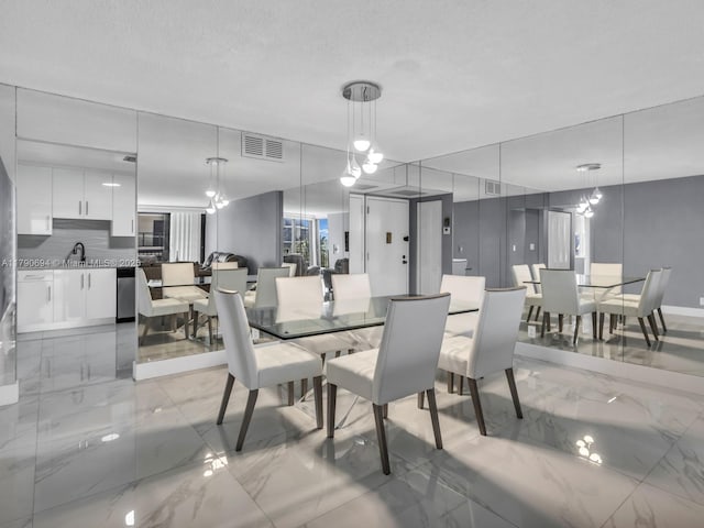 2101 S Ocean Dr Unit 401, Hollywood, FL 33019 - dining space featuring marble finish floor and visible vents