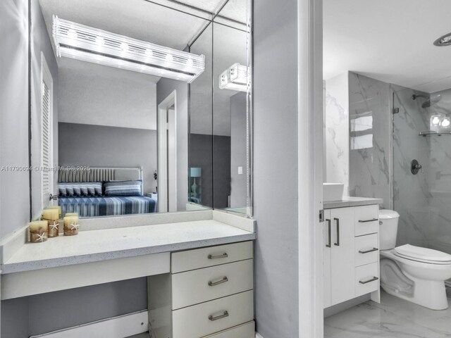 2101 S Ocean Dr Unit 401, Hollywood, FL 33019 - full bath featuring toilet, a marble finish shower, marble finish floor, and vanity