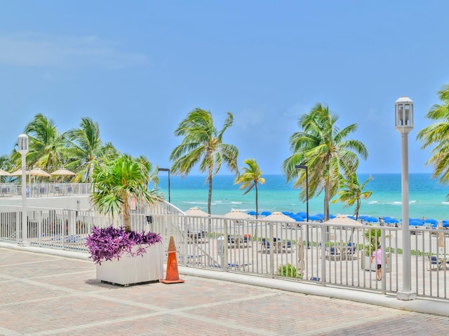 2101 S Ocean Dr Unit 401, Hollywood, FL 33019 - view of gate featuring a water view and fence
