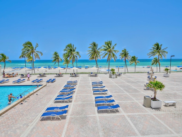 2101 S Ocean Dr Unit 401, Hollywood, FL 33019 - community pool with a patio area, a water view, and a view of the beach