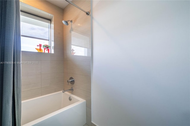bathroom with shower / bath combination