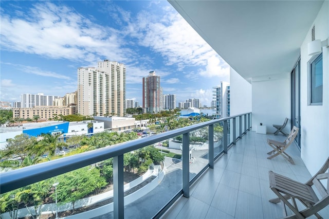 balcony featuring a city view