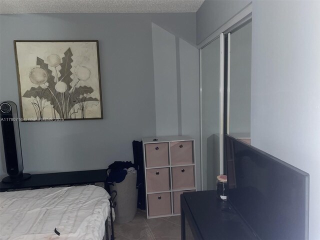 bedroom with a textured ceiling