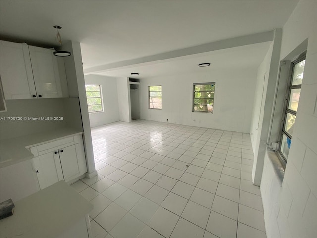 interior space with light tile patterned flooring
