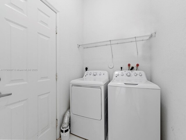 2352 SE 21st St, Homestead, FL 33035 - bathroom featuring vanity, a textured wall, and tile patterned floors