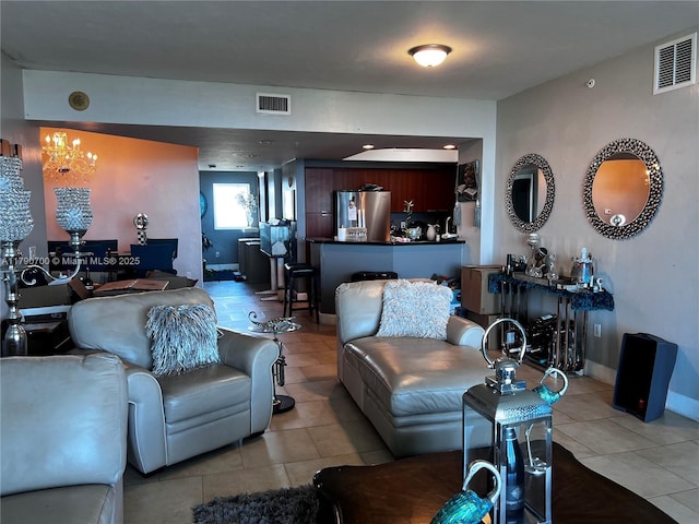 15051 Royal Oaks Ln Unit 2301, North Miami, FL 33181 - living area featuring light tile patterned flooring and a chandelier